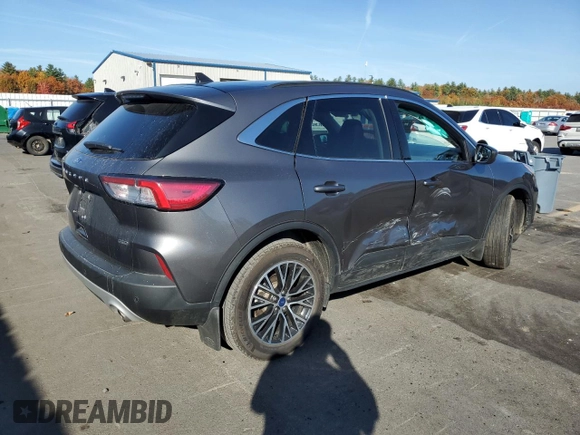 2022 Ford Escape Titanium Plug-In Hybrid with VIN 1FMCU0LZ8NUB74213, listed as a Copart auction lot 77133004 with 18,490 mi miles and Salvage title. Bid and sale history available at DreamBid. Image 3.