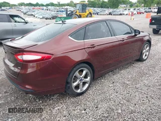 2015 Ford Fusion SE with VIN 3FA6P0H70FR179193, listed as a IAAI auction lot 42115451 with 82,757 mi miles and . Bid and sale history available at DreamBid. Image 4.