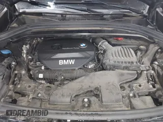 2018 BMW X1 xDrive28i with VIN WBXHT3C30J5K29383, listed as a IAAI auction lot 41503314 with 107,678 mi miles. Bid and sale history available at carsss.com. Image 10.