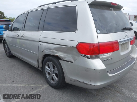 2008 Honda Odyssey Touring with VIN 5FNRL38908B058867, listed as a IAAI auction lot 42126471 with 201,088 mi miles and . Bid and sale history available at DreamBid. Image 3.
