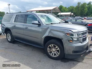 2020 Chevrolet Suburban LT with VIN 1GNSKHKC9LR262938, listed as a IAAI auction lot 40564599 with 116,870 mi miles. Bid and sale history available at carsss.com. Image 1.