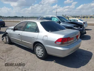 2002 Honda Accord LX z VIN JHMCG56462C005400, wystawiony jako IAAI lot #41893400 z przebiegiem Nie podano mil oraz . Historia ofert i sprzedaży dostępna na DreamBid. Obrazek 3.