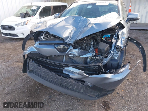 2023 Toyota Corolla Cross Hybrid S with VIN 7MUFBABG3PV005338, listed as a IAAI auction lot 41633311 with 32,082 mi miles and . Bid and sale history available at DreamBid. Image 6.
