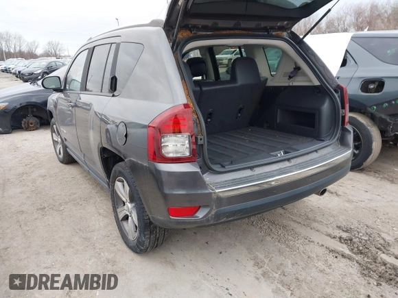 2016 Jeep Compass High Altitude Edition with VIN 1C4NJCEAXGD760221, listed as a IAAI auction lot 41486540 with 104,900 mi miles. Bid and sale history available at carsss.com. Image 3.