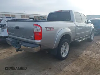 2004 Toyota Tundra SR5 with VIN 5TBET341X4S456553, listed as a IAAI auction lot 41912335 with 98,943 mi miles and . Bid and sale history available at carsss.com. Image 4.
