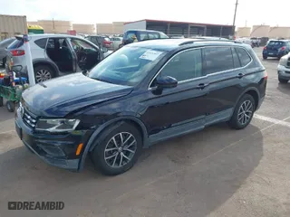 2019 Volkswagen Tiguan SE with VIN 3VV3B7AXXKM012766, listed as a IAAI auction lot 41571347 with 56,594 mi miles. Bid and sale history available at carsss.com. Image 2.