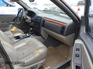 1999 Jeep Grand Cherokee Laredo с VIN 1J4G258S8XC650533, выставлен на аукционе IAAI как лот 41583331 с пробегом 245 164 миль миль и . История ставок и продаж доступна на DreamBid. Изображение 5.