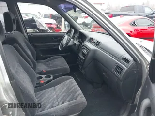 1999 Honda CR-V EX with VIN JHLRD1866XC033865, listed as a IAAI auction lot 41219896 with 142,396 mi miles. Bid and sale history available at carsss.com. Image 5.