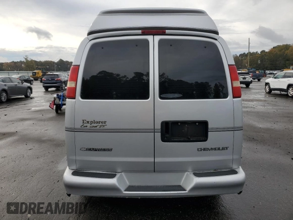 2003 Chevrolet Express Cargo YF7 Upfitter with VIN 1GBFG15T031162552, listed as a Copart auction lot 79677874 with 187,193 mi miles and Salvage title. Bid and sale history available at DreamBid. Image 6.