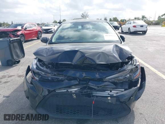 2022 Toyota Corolla LE with VIN 5YFEPMAE6NP348613, listed as a IAAI auction lot 41709618 with 64,406 mi miles and . Bid and sale history available at DreamBid. Image 12.