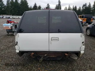 1997 Chevrolet Tahoe z VIN 3GNEC18R7VG122449, wystawiony jako Copart lot #85718304 z przebiegiem Nie podano mil oraz Szkoda całkowita • Salvage title. Historia ofert i sprzedaży dostępna na DreamBid. Obrazek 6.