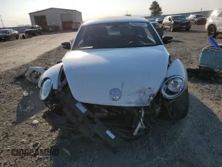 2016 Volkswagen Beetle Turbo R-Line with VIN 3VWVT7AT9GM602303, listed as a Copart auction lot 63845354 with 65,796 mi miles and Salvage Title. Bid and sale history available at DreamBid. Image 5.