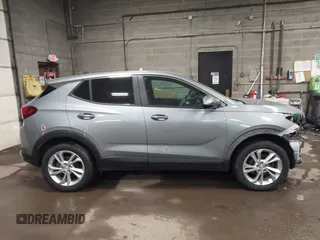 2023 Buick Encore GX Preferred with VIN KL4MMCSL9PB093284, listed as a IAAI auction lot 41276805 with 17,006 mi miles and . Bid and sale history available at DreamBid. Image 13.