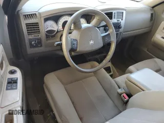 2006 Dodge Dakota SLT z VIN 1D7HE42N36S523634, wystawiony jako Copart lot #62717474 z przebiegiem 72 295 mil mil oraz Szkoda całkowita • Salvage title. Historia ofert i sprzedaży dostępna na DreamBid. Obrazek 8.