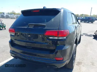 2021 Jeep Grand Cherokee Limited with VIN 1C4RJFBG5MC671721, listed as a IAAI auction lot 42129371 with 23,900 mi miles and . Bid and sale history available at DreamBid. Image 4.