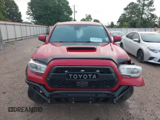 2019 Toyota Tacoma SR5 with VIN 3TMAZ5CN1KM092783, listed as a IAAI auction lot 42181784 with 86,272 mi miles and . Bid and sale history available at DreamBid. Image 13.