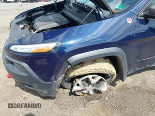 2014 Jeep Cherokee Trailhawk с VIN 1C4PJMBS4EW281449, выставлен на аукционе IAAI как лот 42477320 с пробегом 128 107 миль миль и . История ставок и продаж доступна на DreamBid. Изображение 6.