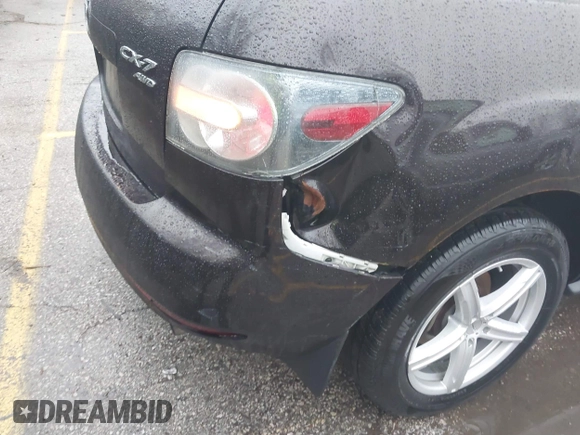 2010 Mazda CX-7 Grand Touring z VIN JM3ER4W32A0338657, wystawiony jako IAAI lot #41207462 z przebiegiem 257 713 mil mil oraz . Historia ofert i sprzedaży dostępna na DreamBid. Obrazek 6.