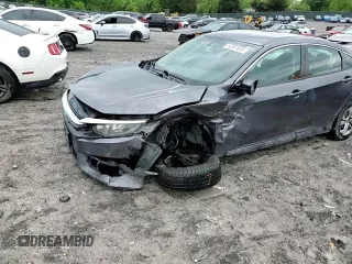 2017 Honda Civic LX z VIN 2HGFC2F56HH521264, wystawiony jako Copart lot #54561605 z przebiegiem 108 099 mil mil oraz Szkoda całkowita • Salvage title. Historia ofert i sprzedaży dostępna na DreamBid. Obrazek 13.