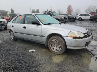 1996 Honda Civic LX "O" w/Air with VIN 1HGEJ6677TL017344, listed as a Copart auction lot 82582494 with 202,514 mi miles and Salvage Title. Bid and sale history available at carsss.com. Image 4.