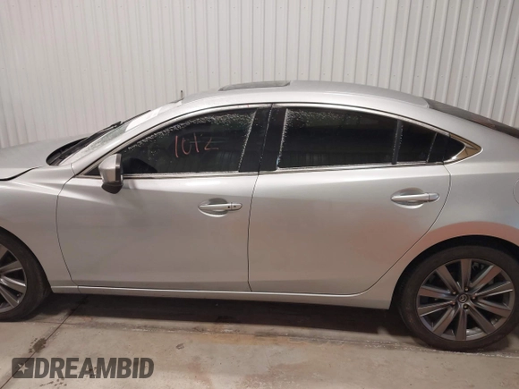 2018 Mazda 6 Touring with VIN JM1GL1VM8J1312778, listed as a IAAI auction lot 41387098 with 129,611 mi miles and . Bid and sale history available at carsss.com. Image 14.