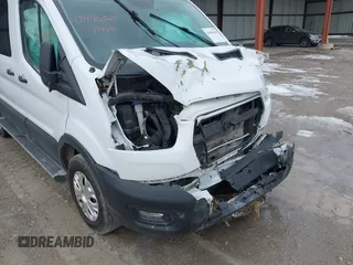2020 Ford Transit Cargo with VIN 1FTBR1Y84LKB05972, listed as a IAAI auction lot 41496329 with Not Provided miles and . Bid and sale history available at DreamBid. Image 18.