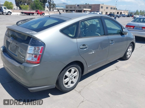 2005 Toyota Prius with VIN JTDKB20U553008263, listed as a IAAI auction lot 42149210 with 235,510 mi miles. Bid and sale history available at carsss.com. Image 4.