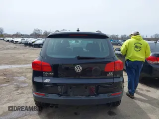 2018 Volkswagen Tiguan with VIN WVGBV7AX3JK002325, listed as a IAAI auction lot 41960059 with 57,619 mi miles and . Bid and sale history available at DreamBid. Image 16.