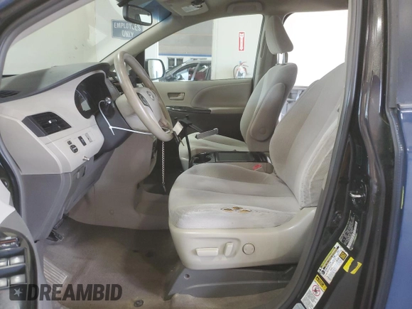 2014 Toyota Sienna LE AAS with VIN 5TDKK3DC7ES451097, listed as a Copart auction lot 55211105 with 251,705 mi miles and Salvage Title. Bid and sale history available at DreamBid. Image 7.