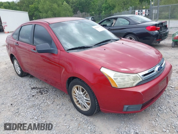 2011 Ford Focus SE with VIN 1FAHP3FN7BW189853, listed as a IAAI auction lot 42121843 with 98,921 mi miles. Bid and sale history available at carsss.com. Image 1.