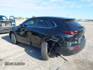 2023 Mazda CX-30 S Select with VIN 3MVDMBBM9PM508958, listed as a IAAI auction lot 42009029 with 21,219 mi miles and . Bid and sale history available at DreamBid. Image 3.