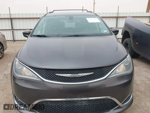 2018 Chrysler Pacifica Touring L with VIN 2C4RC1BG2JR116273, listed as a IAAI auction lot 41922292 with 125,159 mi miles and . Bid and sale history available at DreamBid. Image 12.