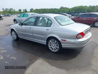 2003 Jaguar X-Type 2.5L Manual with VIN SAJEA51D33XC93300, listed as a IAAI auction lot 42048118 with 116,939 mi miles and . Bid and sale history available at DreamBid. Image 3.