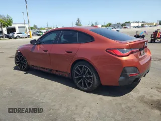2022 BMW 4 Series 430i with VIN WBA63AV06NFM11260, listed as a Copart auction lot 57551825 with 52,969 mi miles and Salvage title. Bid and sale history available at DreamBid. Image 2.