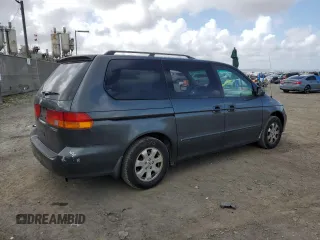 2004 Honda Odyssey EX-L with VIN 5FNRL18944B052617, listed as a Copart auction lot 51443625 with 144,346 mi miles and Salvage Title. Bid and sale history available at DreamBid. Image 3.