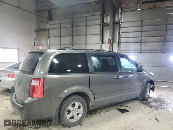 2010 Dodge Grand Caravan Hero with VIN 2D4RN3D14AR438334, listed as a Copart auction lot 45328305 with 151,521 mi miles and Salvage Title. Bid and sale history available at DreamBid. Image 3.