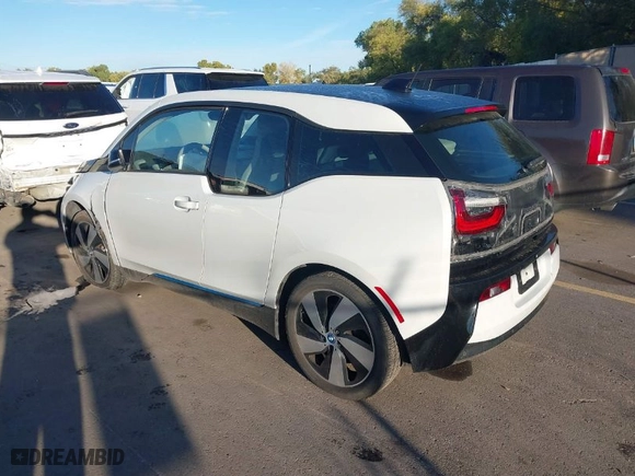 2015 BMW i3 with VIN WBY1Z4C52FV503063, listed as a IAAI auction lot 40644359 with NaN miles. Bid and sale history available at carsss.com. Image 3.