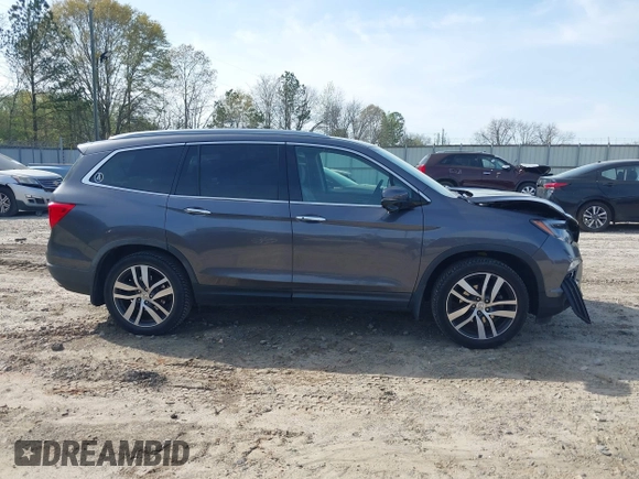 2017 Honda Pilot Touring with VIN 5FNYF5H9XHB046479, listed as a IAAI auction lot 41941449 with 162,554 mi miles. Bid and sale history available at carsss.com. Image 13.