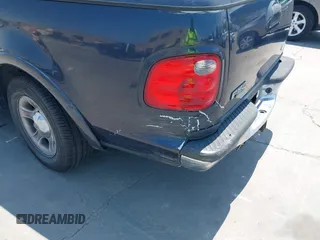 2001 Ford F-150 XLT с VIN 1FTRW07671KC48137, выставлен на аукционе IAAI как лот 42448229 с пробегом 107 306 миль миль и . История ставок и продаж доступна на DreamBid. Изображение 6.