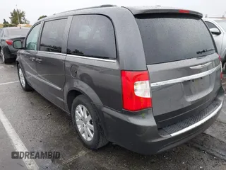 2015 Chrysler Town & Country Touring with VIN 2C4RC1BG9FR720782, listed as a IAAI auction lot 41765488 with 129,889 mi miles and . Bid and sale history available at DreamBid. Image 3.