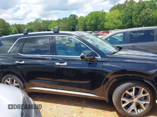 2021 Hyundai Palisade Limited z VIN KM8R5DHE2MU183279, wystawiony jako IAAI lot #42244440 z przebiegiem 53 789 mil mil oraz . Historia ofert i sprzedaży dostępna na DreamBid. Obrazek 5.