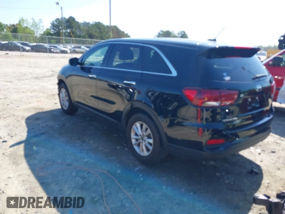 2019 Kia Sorento L with VIN 5XYPG4A38KG574269, listed as a IAAI auction lot 42003610 with 129,896 mi miles and . Bid and sale history available at DreamBid. Image 3.