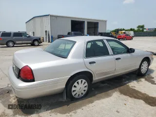 2010 Ford Police Interceptor with VIN 2FABP7BV2AX126536, listed as a Copart auction lot 60327535 with 138,759 mi miles and Salvage title. Bid and sale history available at DreamBid. Image 3.