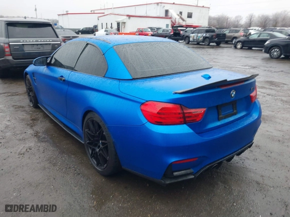 2015 BMW M4 with VIN WBS3U9C5XFJ968082, listed as a IAAI auction lot 41513593 with 57,715 mi miles. Bid and sale history available at carsss.com. Image 3.