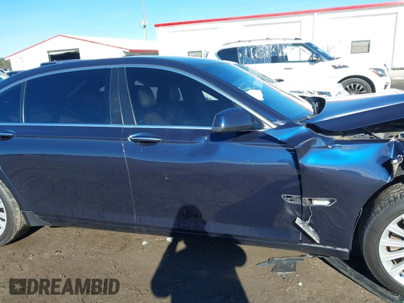 2012 BMW 7 Series 750Li xDrive with VIN WBAKC8C52CC436399, listed as a IAAI auction lot 41214440 with 122,532 mi miles and . Bid and sale history available at DreamBid. Image 13.