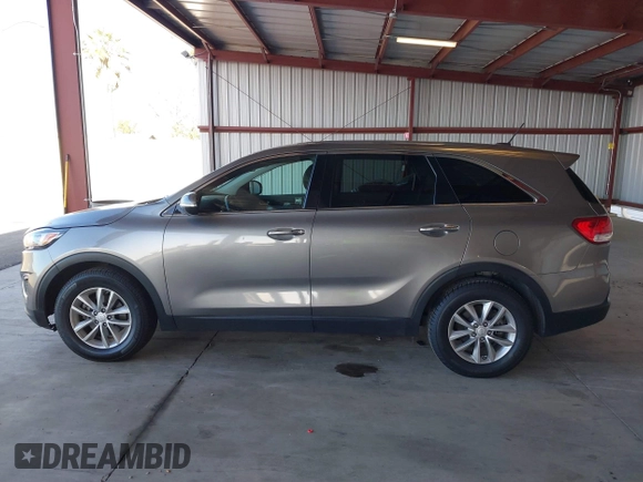 2018 Kia Sorento LX with VIN 5XYPG4A39JG417378, listed as a IAAI auction lot 41671284 with 216,876 mi miles. Bid and sale history available at carsss.com. Image 14.