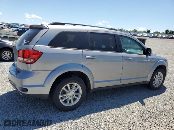 2017 Dodge Journey SXT with VIN 3C4PDDBG3HT591993, listed as a Copart auction lot 58241065 with 161,964 mi miles and Salvage title. Bid and sale history available at DreamBid. Image 3.