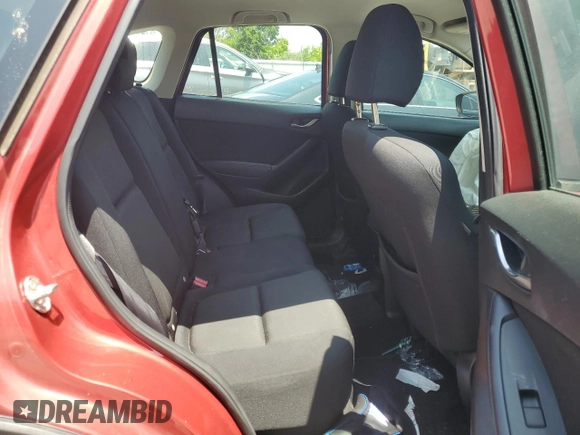 2016 Mazda CX-5 Sport with VIN JM3KE4BY3G0765905, listed as a Copart auction lot 61874165 with 134,546 mi miles and Salvage title. Bid and sale history available at DreamBid. Image 11.