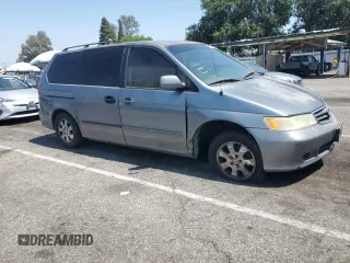 2002 Honda Odyssey EX-L with VIN 2HKRL189X2H530814, listed as a Copart auction lot 62280465 with 270,080 mi miles and Salvage title. Bid and sale history available at DreamBid. Image 4.