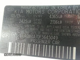 2015 Kia Optima LX with VIN KNAGM4A70F5645049, listed as a IAAI auction lot 42758383 with 214,934 mi miles and . Bid and sale history available at DreamBid. Image 9.